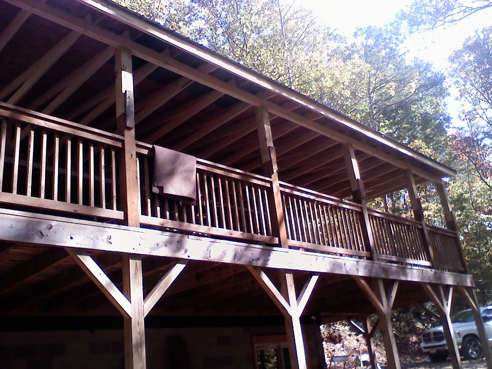 Timber framing under a new elevated porch and deck — Roof Leak Repair in Milledgeville by Roofing Brothers